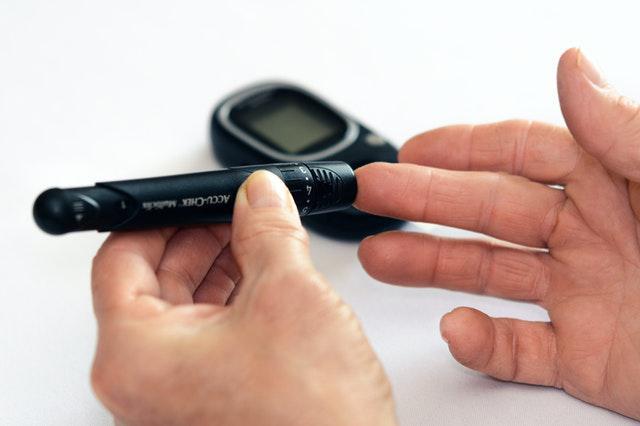 Man checking for diabetes during the pandemic