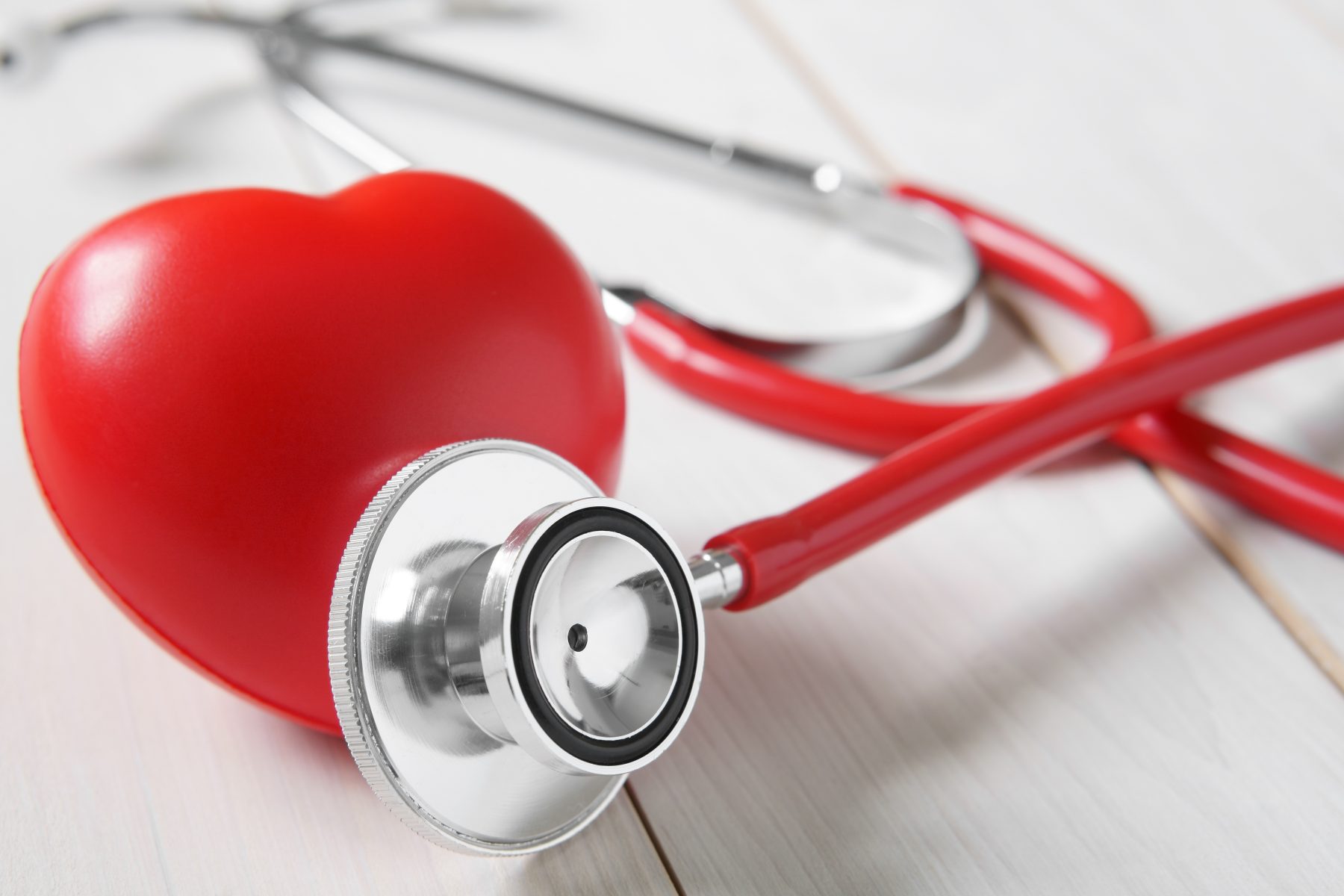 Close up of red heart and stethoscope representing cardiovascular and metabolic health