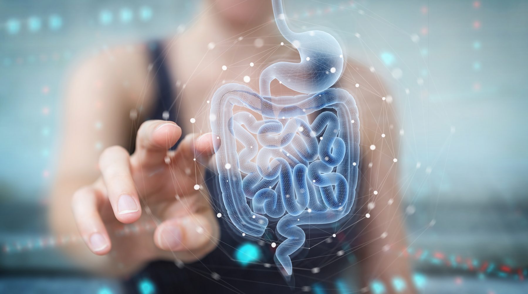 Woman with digital x-ray of human intestine holographic scan evaluating gut health.