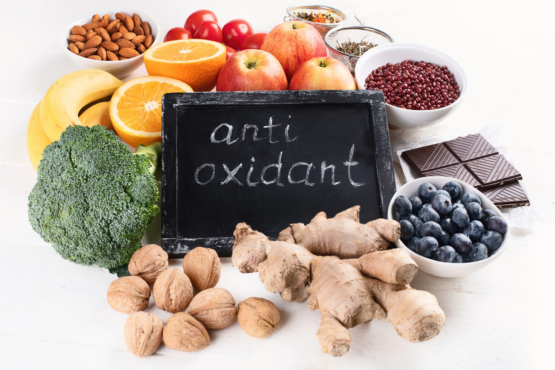 Food sources of natural antioxidants surrounding sign that says antioxidant