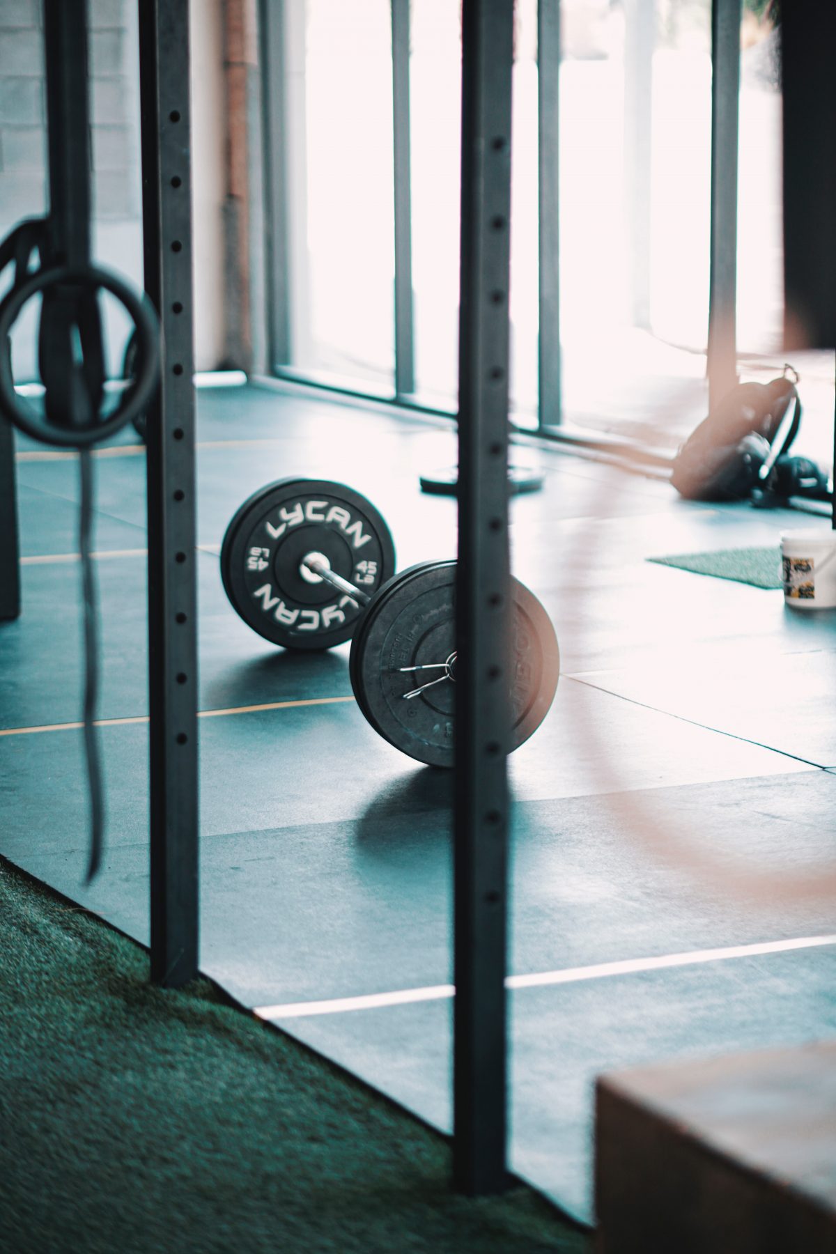 Long shot of a weight room with free weights for fitness