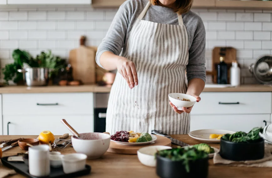 Woman preparing a healthy meal at home