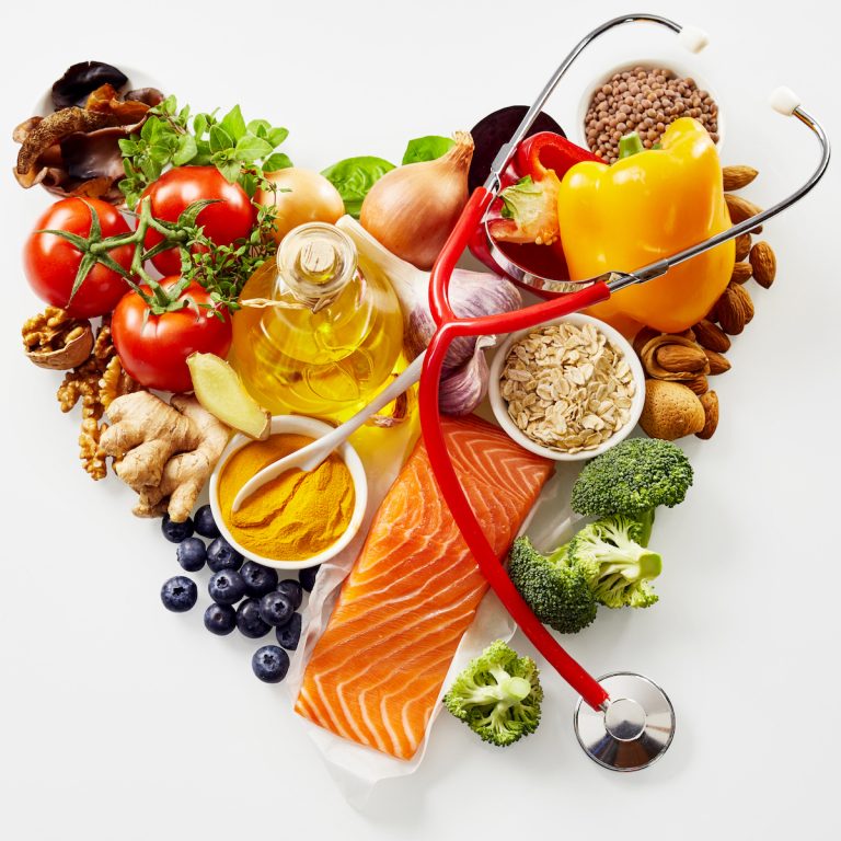 Heart symbol made up of healthy foods and stethoscope to represent integrative medicine