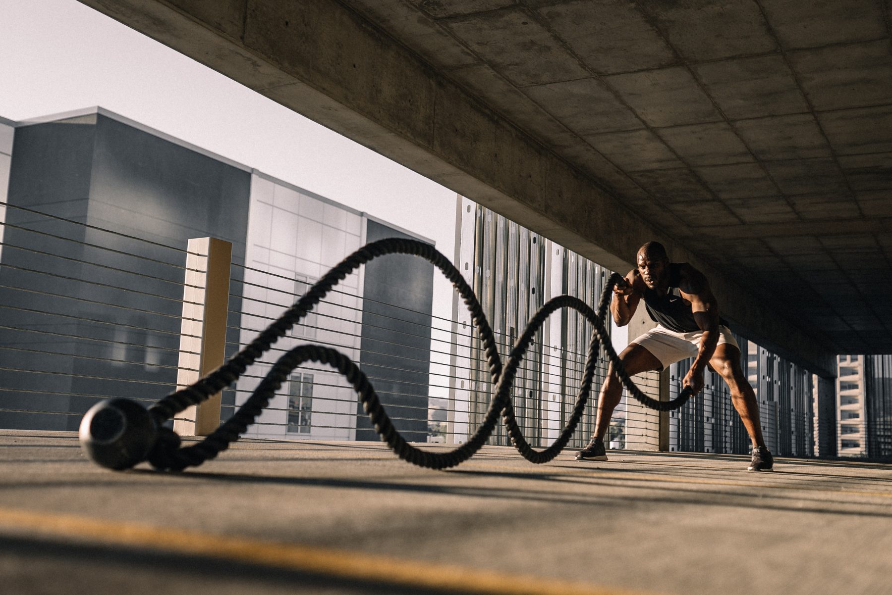 Man working out in parking garage